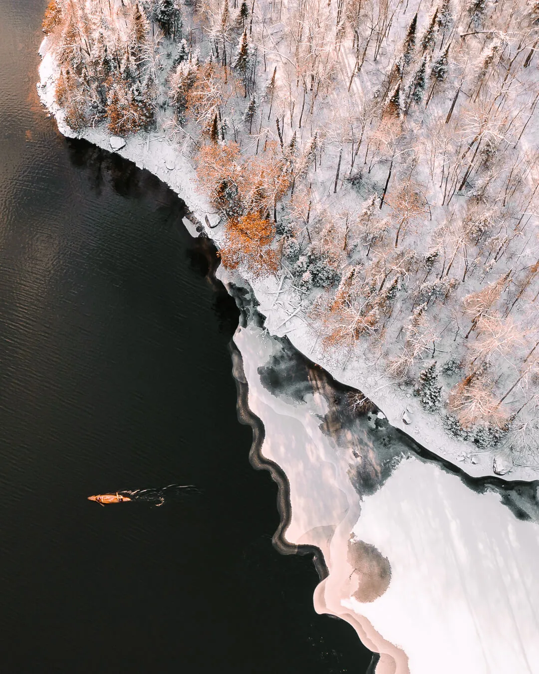 Drone photo of a canoe at the Parc du Poisson Blanc while filming Martin Trahan a Canadian adventurer